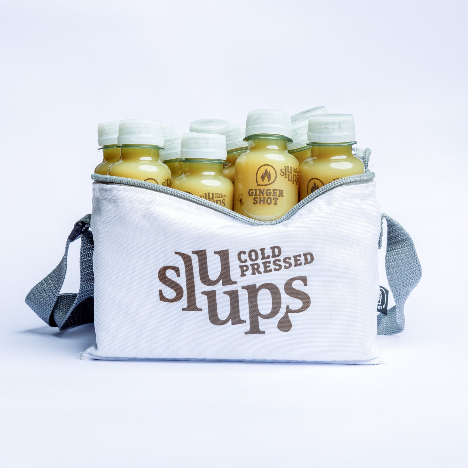 12 shots de gingembre, y compris un sac isotherme Sluups